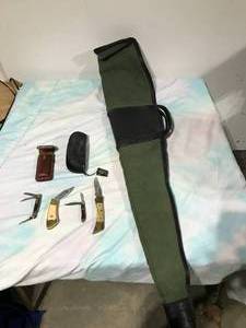 lot 60 image: 4 pocket knives & gun case