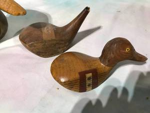 lot 66 image: Vintage duck decoy and wooden golf head