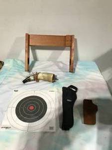 lot 67 image: Black powder horn, 2 pistol holders, targets and gun cleaning rack