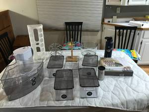 lot 225 image: Thermos, spice racks, Brita pitcher for water, M Design plastic containers, Bannana holder, starbucks stainless steel coffee cup, fruit bowl