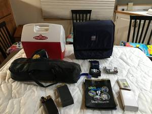 lot 84 image: 2 coolers. Wine opener set, tent, misquito net and more