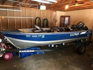 lot 6 image: 1996 16 aluminum Lund Rebel Adventure boat with 25hp Yamaha outboard motor