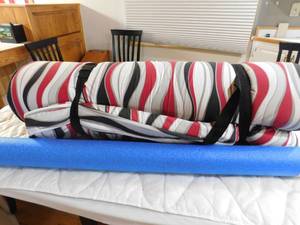 lot 40 image: Camping mat and swimmers noodle