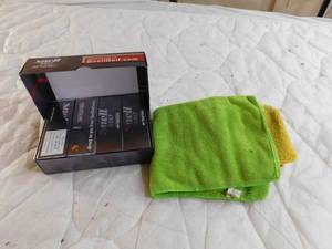 lot 156 image: 12 tour caliber urethane golf balls and golf towels
