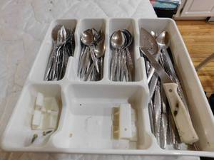 lot 36 image: Organizer full of silverware
