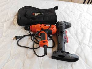 lot 18 image: Black& decker electric and Craftsman battery drill