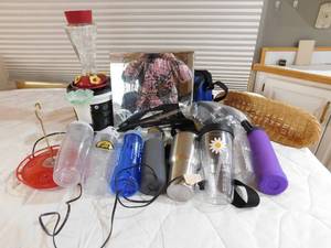 lot 33 image: Jack Daniels mirror, Tarvis tumblers, humming bird feeders and more