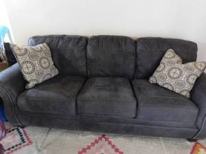 lot 300 image: suede leather look couch with 2 pillows