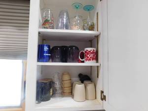 lot 296 image: Everything in the 2 cupboards  dishes