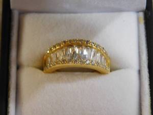 lot 119 image: Gold covered sterling silver ring with stones