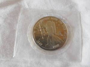 lot 272 image: 1969 - 1989 First men on the moon 5 dollar coin