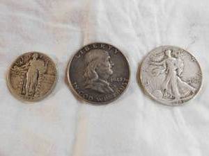 lot 276 image: (3 coins) 1948 Franklin half dollar - 1943 walking liberty half dollar - 1928 standing liberty quarter