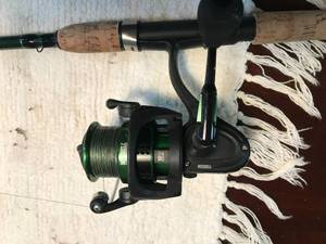 lot 103 image: 2 fishing rods and reels