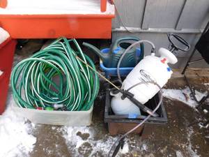 lot 329 image: Garden hoses, flower pots, hose sprayers and more