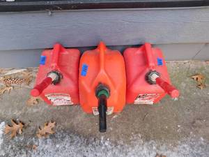 lot 331 image: 3 plastic gas cans