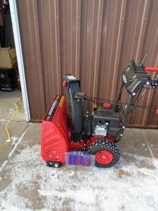 Power smartsnow blower. 212 cc 24 path. Electric start with heated hand gripslight. Had small dent that was fixed. Otherwise like new. As shown.