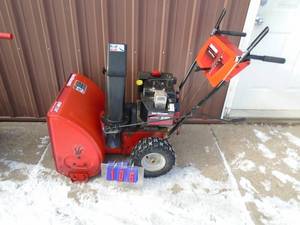 Yard Machine 8 hp snow blower. Electric start. Lightly used. Tested & works. As shown.