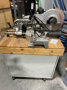 lot 3 image: 10 Sliding Compound Miter Saw Mounted on Cabinet