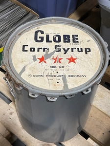 lot 25 image: Vintage Globe Corn Syrup Container