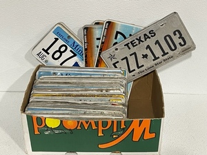 lot 35 image: Box of License Plates