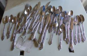 Large group of Wm Rogers Stainless matching silverware