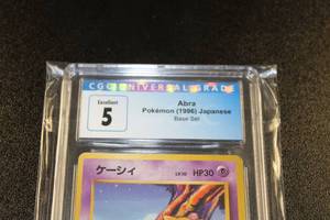 lot 10 image: 1996 Pokemon Japanese Base Set Abra #063 CGC 5