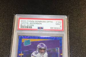 lot 25 image: 2020 Donruss Optic Blue Scope Prizm Justin Jefferson #163 Rookie Card PSA 9