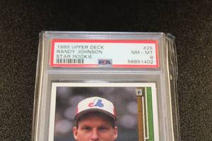 lot 34 image: 1989 Upper Deck Randy Johnson #25 Rookie Card PSA 8