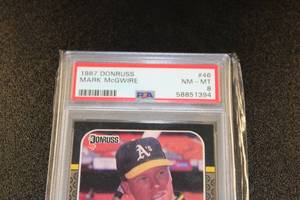 lot 42 image: 1987 Donruss Mark McGwire #46 Rookie Card PSA 8