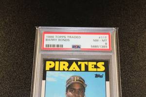 lot 45 image: 1986 Topps Traded Barry Bonds #11T Rookie Card PSA 8