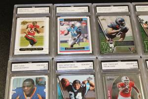 lot 122 image: Football Card Graded Card Lot  14 Graded Football Cards Plus Tiger Woods