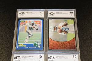 lot 126 image: Football Basketball & Golf Cris Carter Marvin Harrison Arnold Palmer Michael Jordan BCCG 10 Graded Lot  4 Graded Cards