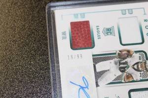 lot 132 image: 2020 Absolute Rookie Premier Triple Relic Patch Autograph Jalen Reagor 1999  Only 99 Exist