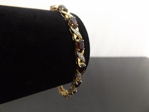 .925 Sterling Silver Diamond Accented Oval Cut Garnet Hugs and Kisses&nbspVermeil&nbspBracelet Size 8
