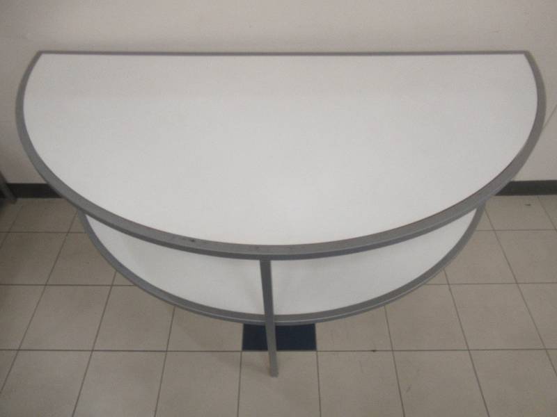 2-Tier Half Circle Display Table (Buy 2 for Whole Circle), Approximate Dimensions 72 x 36 x 34 Tall. Slight Scratch and Dent.
