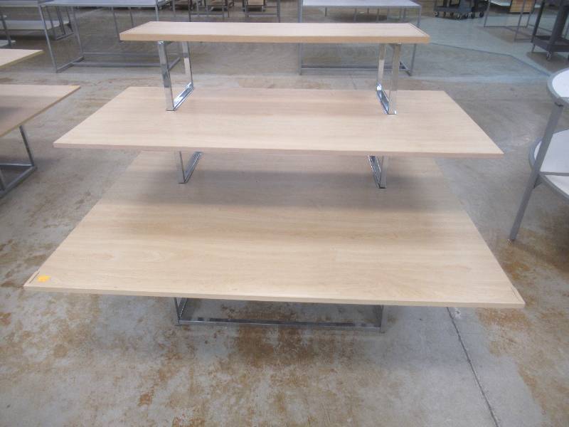 3-Tier Display Table. Approximate Dimensions 62 x 45 x 48 Tall. Slight Scratch and Dent.