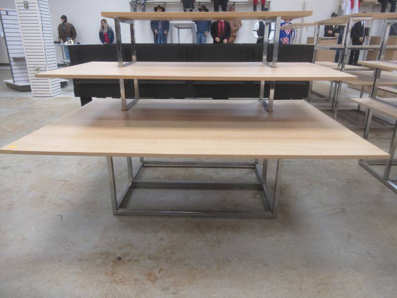 3-Tier Display Table. Approximate Dimensions 62 x 45 x 45 Tall. Slight Scratch and Dent.