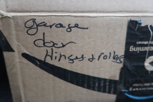 GARAGE DOOR HINGES AND ROLLERS