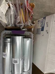 lot 10 image: LARGE ASSORTMENT DRYER VENTS,CORDS,OTHER MISC VENTING