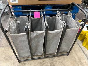 lot 23 image: USED, 4 BASKET ORGANIZATION FOR RECYCLING OR LAUNDRY