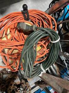 lot 35 image: EXTENTION CORDS AND HAND SAWS