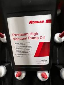 lot 52 image: CASE OF PREMIUM HIGH VACUUM PUMP OIL