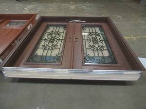 Woodgrain Exterior Double Door - Color for Interior & Exterior is Moorish Teak - Internal Decorative Grille with Iced Glass 74.06 in x 81.68 in - Each Door is 36 in x 80 in (SLIGHT SCRATCH & DENT)