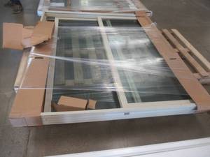 Simonton 6100 Series Patio Door - NO Screen  - Beige Vinyl - 71 in x 79 34 in (SCRATCH & DENT) - DOOR NEEDS TO BE POPPED BACK IN