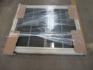 Simonton 6100 Series Sliding Window in Tan Vinyl - Internal Grille with Screen - 47 12 in x 38 34 in (SLIGHT SCRATCH & DENT)
