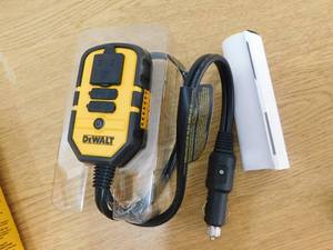 lot 83 image: DEWALT 140-Watt Portable Car Power Inverter with Dual USB Ports