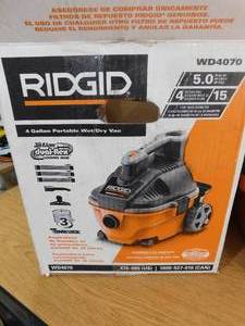 lot 88 image: RIDGID 4 Gallon 5.0 Peak HP Portable WetDry Shop Vacuum with Fine Dust Filter, Locking Hose and Accessories