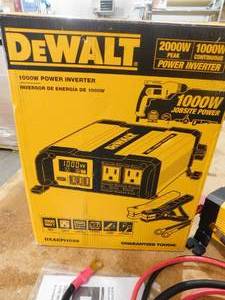 lot 102 image: DEWALT 1000-Watt Portable Car Power Inverter with Triple USB Ports