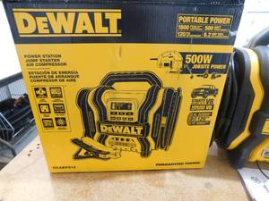 lot 103 image: DEWALT 1600 Peak Amp Portable Car Jump Starter with 120 PSI Digital Air Compressor and 500-Watt Inverter