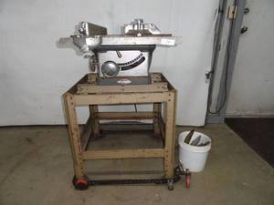 lot 10 image: Table Saw 34 hp with Stand and roller base Craftsman